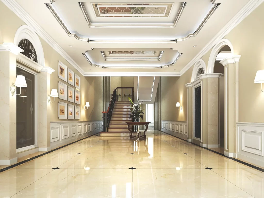 Elegant luxury home entrance with grand double doors, landscaped walkway, and soft evening lighting.